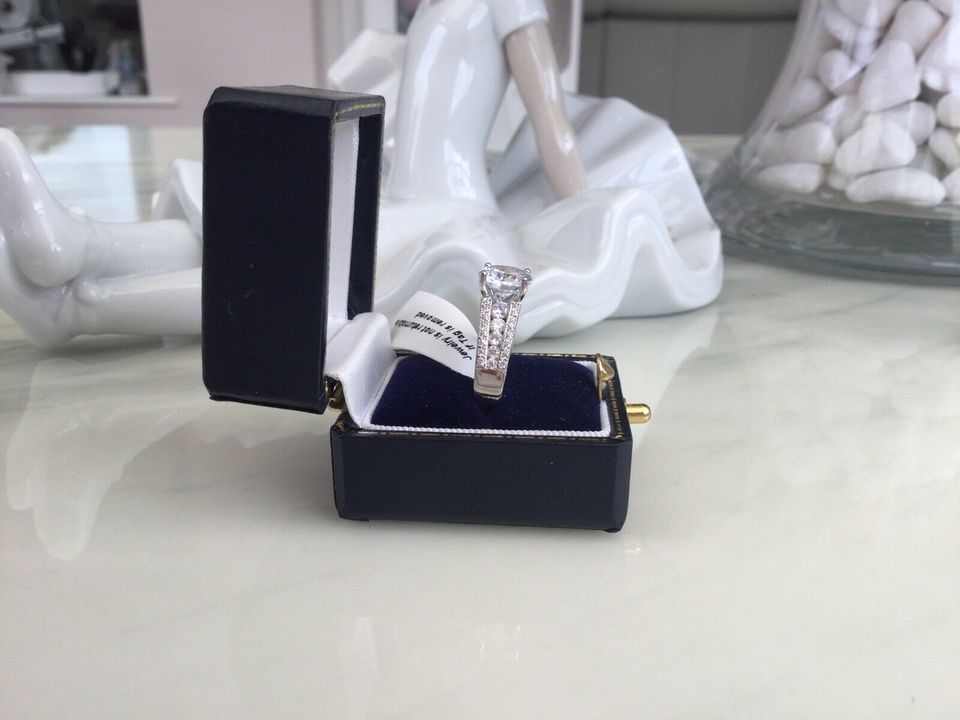 Engagement Style Simulated Diamond Ring set in sterling silver SIZE T