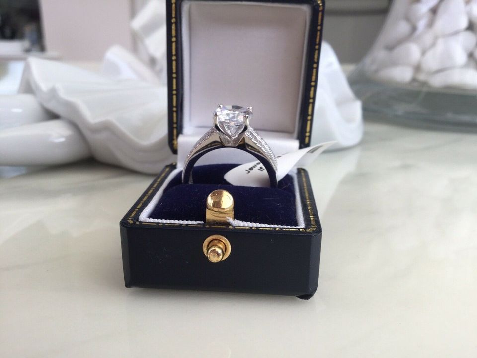 Engagement Style Simulated Diamond Ring set in sterling silver SIZE T