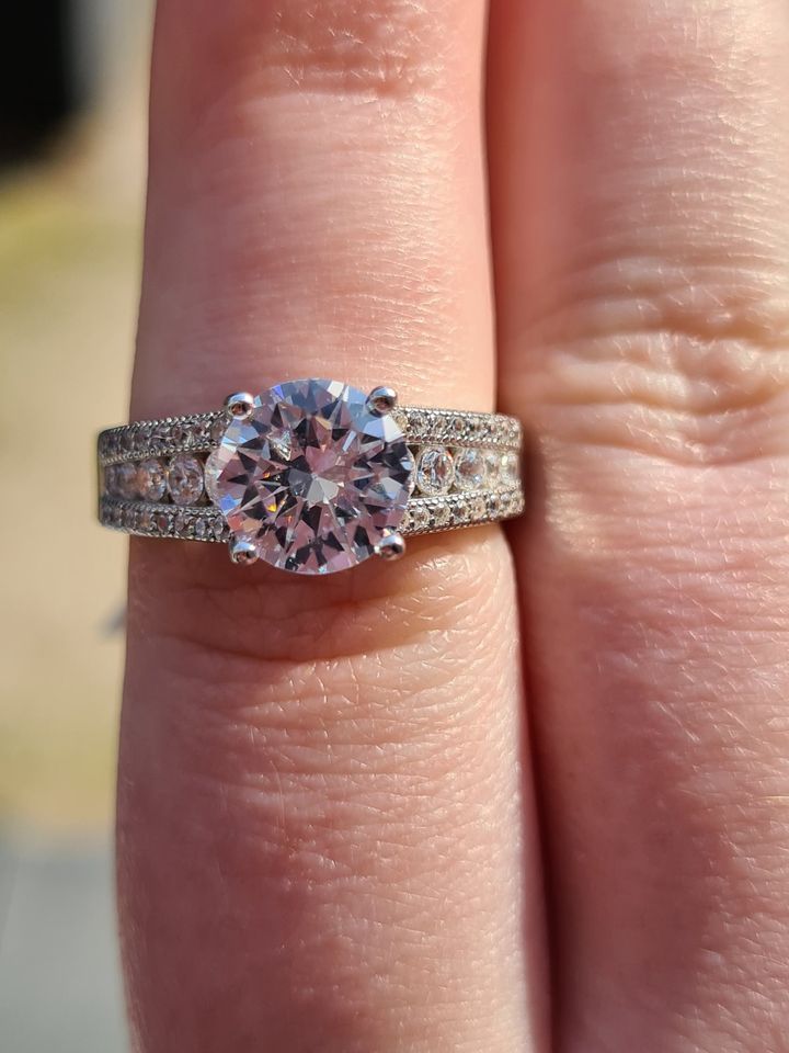 Engagement Style Simulated Diamond Ring set in sterling silver SIZE T