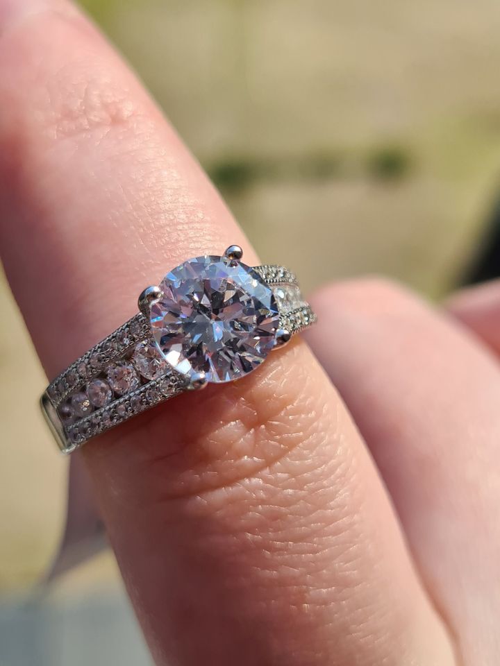 Engagement Style Simulated Diamond Ring set in sterling silver SIZE T