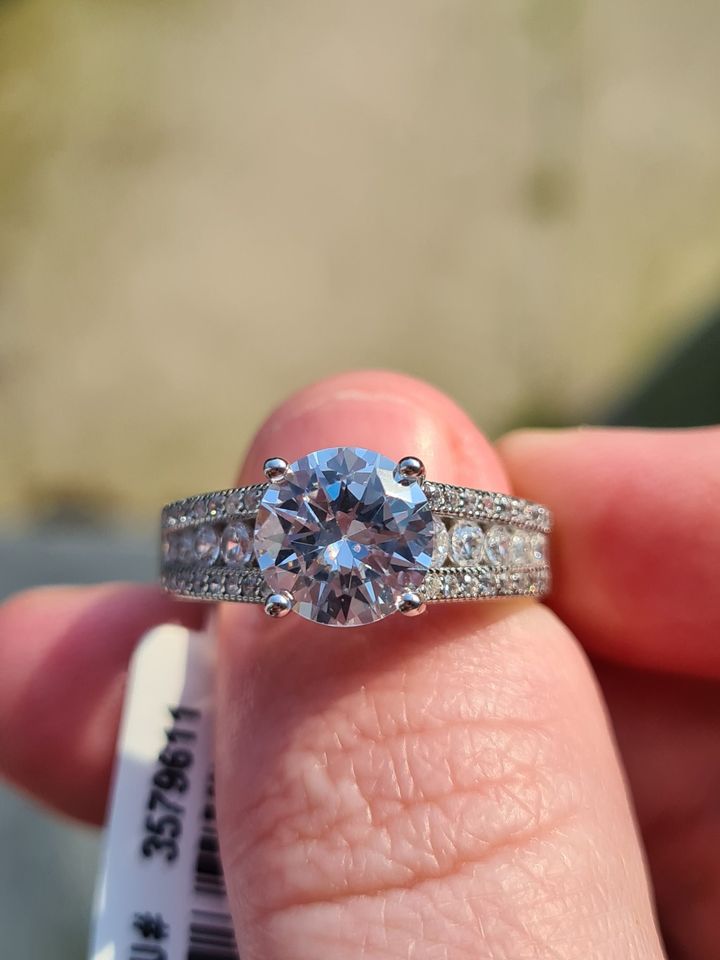 Engagement Style Simulated Diamond Ring set in sterling silver SIZE T