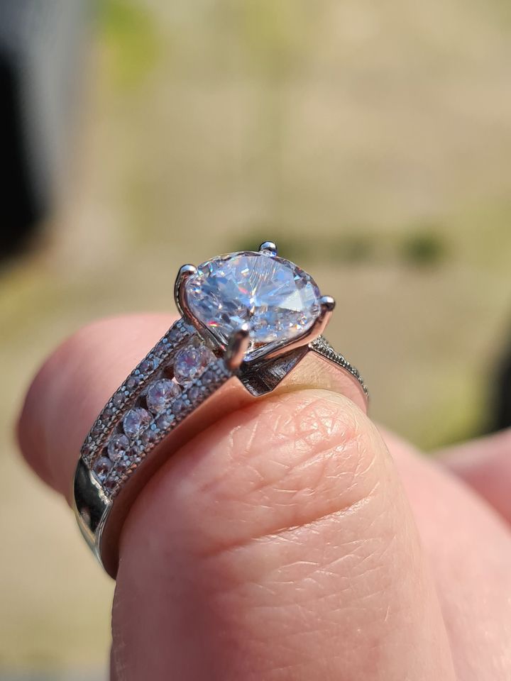 Engagement Style Simulated Diamond Ring set in sterling silver SIZE T