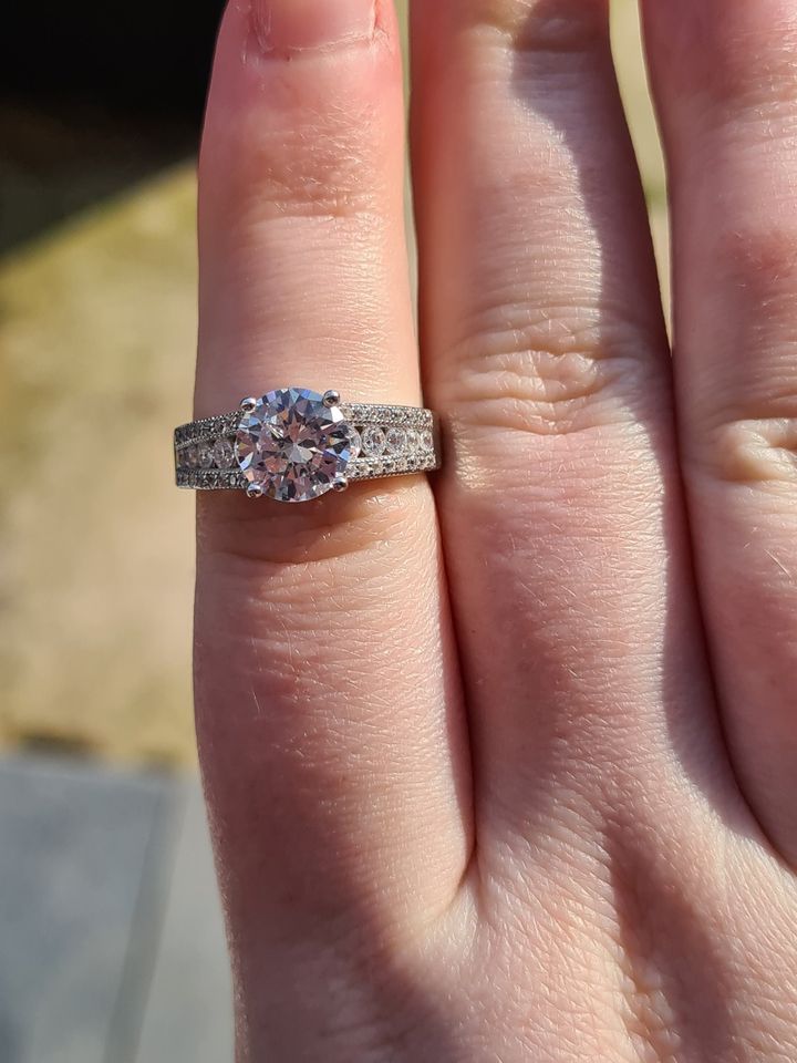 Engagement Style Simulated Diamond Ring set in sterling silver SIZE T