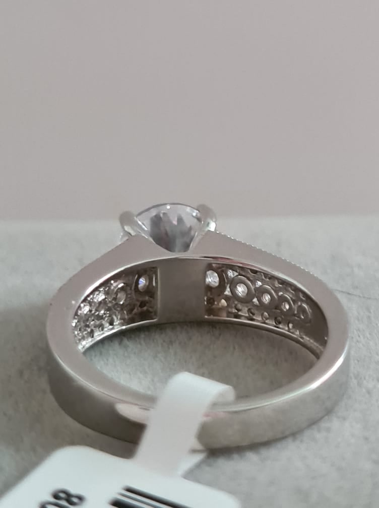 Engagement Style Simulated Diamond Ring set in sterling silver SIZE T